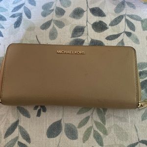 Micheal Kors pebble leather wallet.